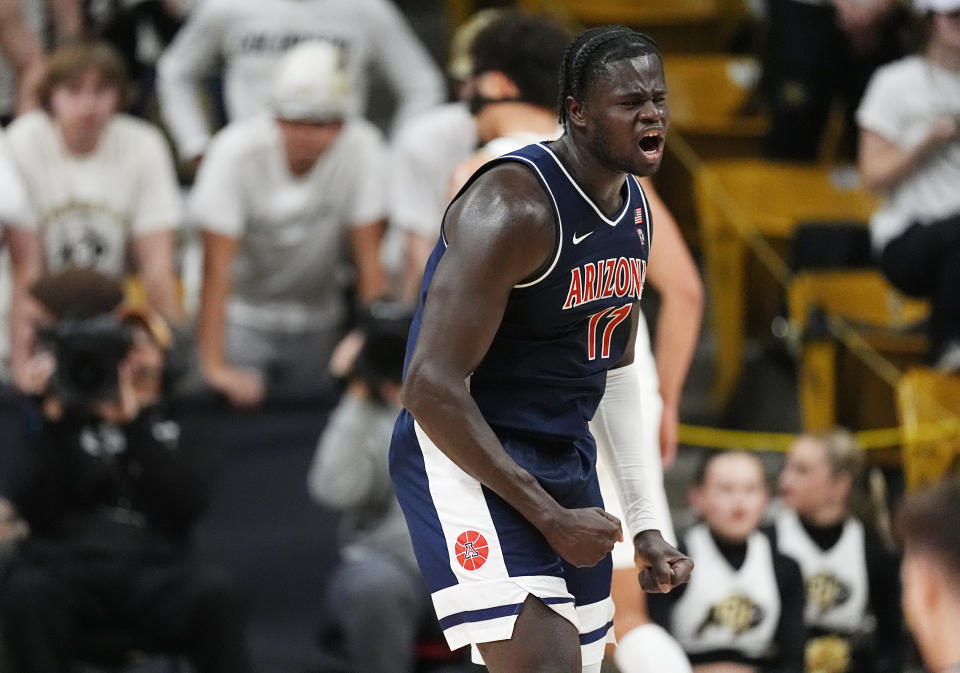Arizona center Oumar Ballo reacts after dunking against Colorado during the second half of an NCAA college basketball game Saturday, Feb. 10, 2024, in Boulder, Colo. (AP Photo/David Zalubowski)