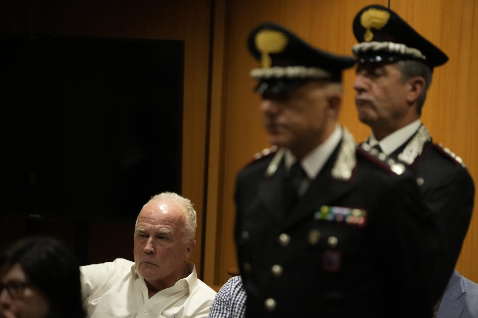 Ethan Elder, father of Finnegan Lee Elder, left, attends a hearing for the appeals trial in which his son is facing murder charges for killing Italian Carabinieri paramilitary police officer Mario Cerciello Rega, in Rome, Wednesday, July 3, 2024. (AP Photo/ Alessandra Tarantino)