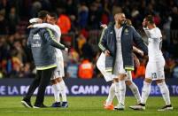 Football Soccer - FC Barcelona v Real Madrid - La Liga - Camp Nou, Barcelona - 2/4/16 Real Madrid's Cristiano Ronaldo celebrates with Karim Benzema and teammates after the match Reuters / Juan Medina Livepic