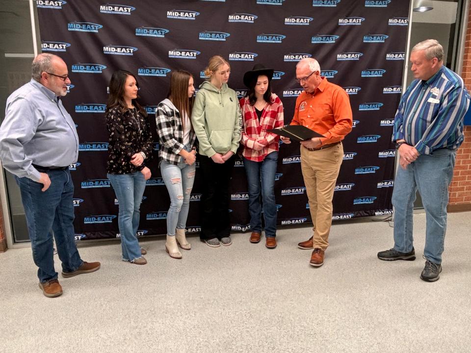 The Guernsey County Commissioners visited the Mid-East Career and Technology Centers Buffalo Campus Monday to present their Dude, Be Kind Week proclamation to SADD Adviser Tracy Brown and club members. Shown, from left, are Commissioner Dave Wilson, Tracy Brown, Mackenzie Hupp, Hayden Roffee, Eliva Borton, Commissioner Jack Marlin and Commissioner Skip Gardner.