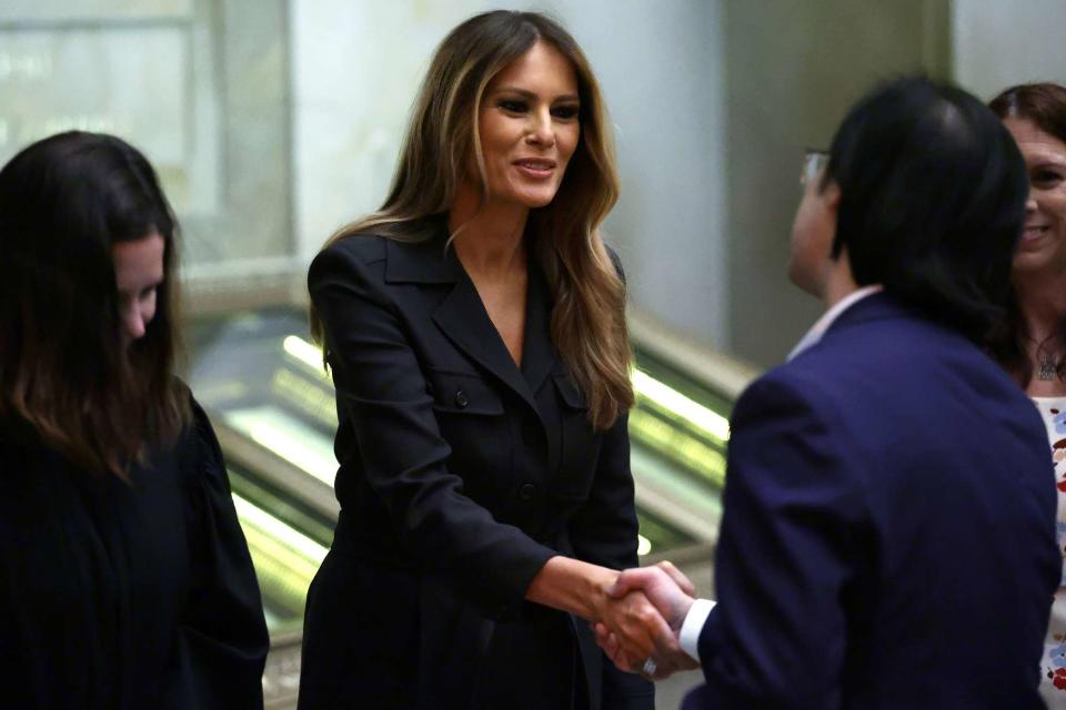 <p>Alex Wong/Getty </p> Melania Trump attends a D.C. naturalization ceremony as a guest on Dec. 15, 2023