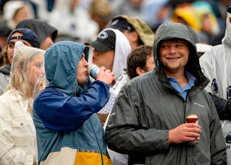 Fans enjoy beers at Beaver Stadium during the Penn State football game against Northwestern on Saturday, Oct. 1, 2022.