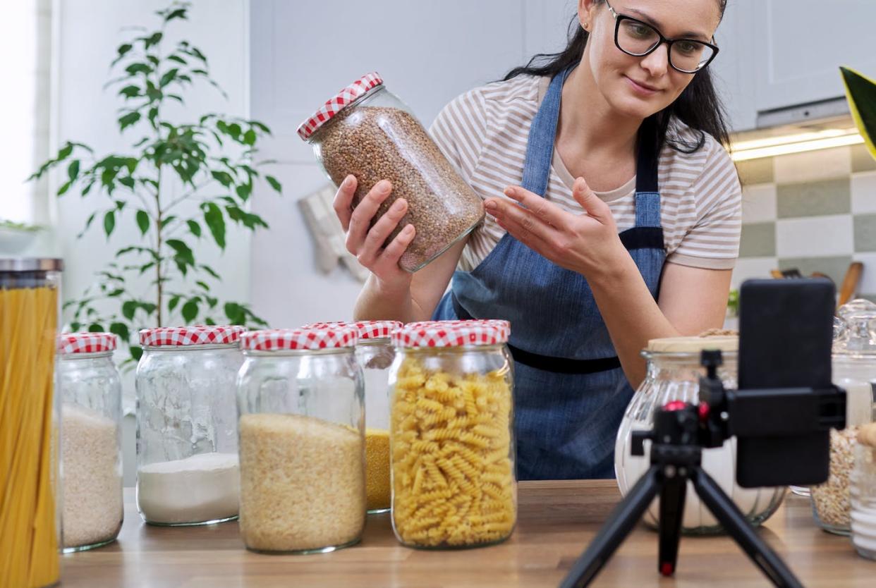 Influencers have started filming themselves shopping for supplies, prepping food, refilling containers and organizing their pantries. <span>Valeriy_G/iStock via Getty Images Plus</span>