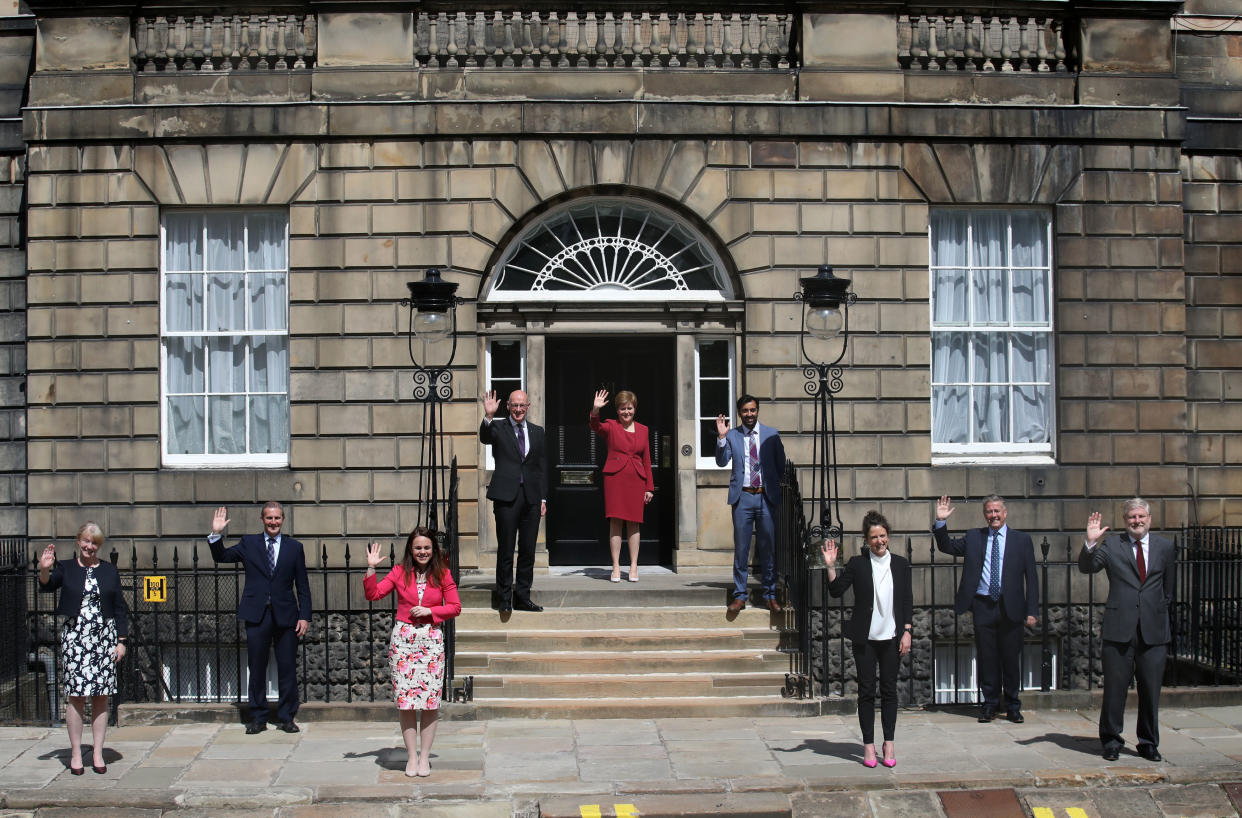 First Minister Nicola Sturgeon on the steps of Bute House in Edinburgh alongside her newly formed Cabinet (Andrew Milligan/PA)