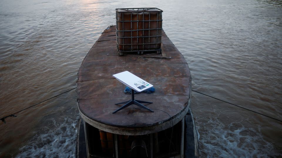 A Starlink satellite internet system is set up on a miner's boat on the Madeira River in Porto Velho, Rondonia state, Brazil, on July 4, 2024. - Adriano Machado/Reuters/File