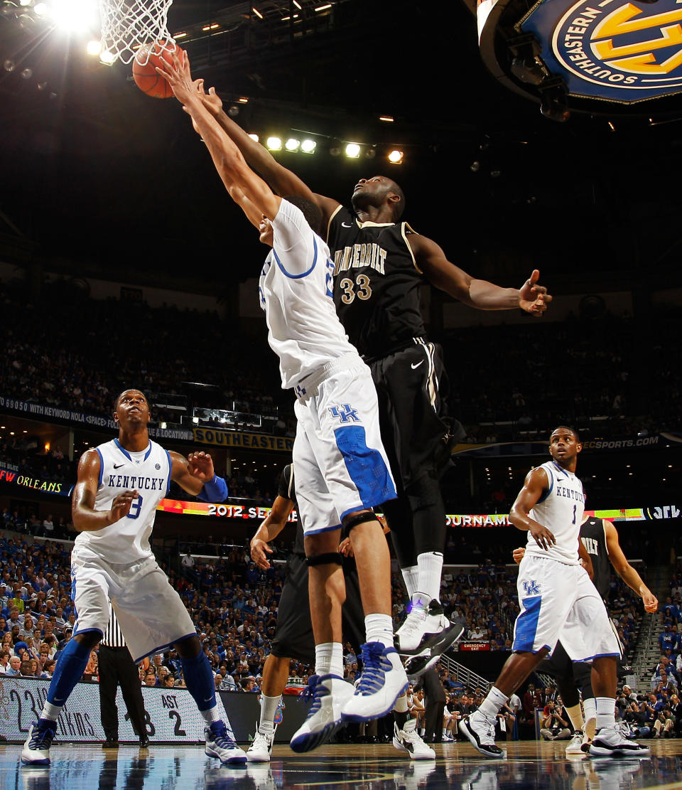 NEW ORLEANS, LA - MARCH 11: Anthony Davis #23 of the Kentucky Wildcats and Steve Tchiengang #33 of the Vanderbilt Commodores vie for a rebound in the second half during the championship game of the 2012 SEC Men's Basketball Tournament at New Orleans Arena on March 11, 2012 in New Orleans, Louisiana. (Photo by Chris Graythen/Getty Images)