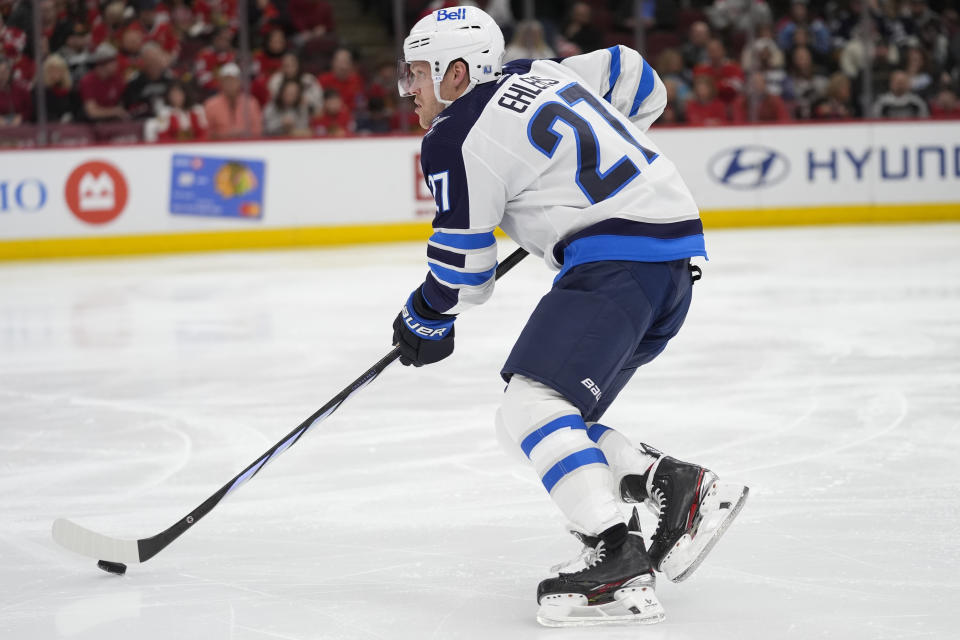 Winnipeg Jets left wing Nikolaj Ehlers takes the puck downice on the way to his second goal of an NHL hockey game, during the second period, against the Chicago Blackhawks, Friday, Feb. 23, 2024, in Chicago. (AP Photo/Erin Hooley)