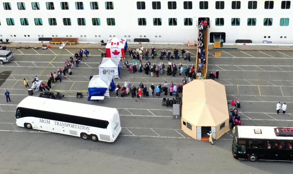 “They were queuing up the passengers like cattle,” Carolyn Wright said as she watched from her cabin window Monday as the first passengers disembarked.  “If that’s safe, then why were we stuck in our rooms?"