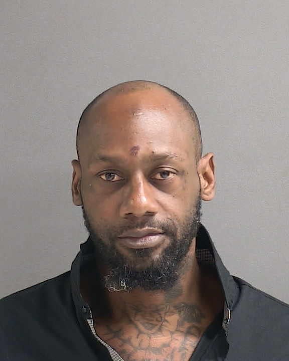 Daytona Beach police said Tacaie Harris, 42, of Daytona Beach, stabbed a Votran bus passenger with a steak knife and robbed the victim of his backpack.