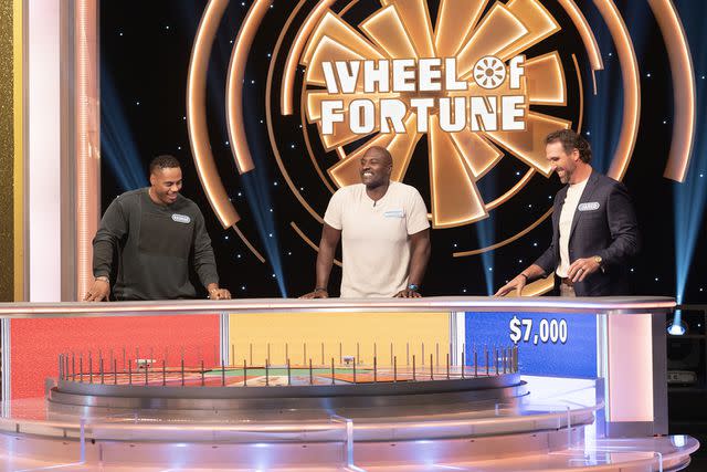 <p>Christopher Willard/DISNEY via Getty</p> Rashad Jennings, Marcellus Wiley and Jared Allen on 'Celebrity Wheel of Fortune.'