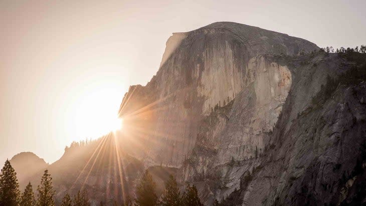 <span class="article__caption">The view from Mirror Lake: Half Dome</span> (Photo: Cavan Images/Getty)