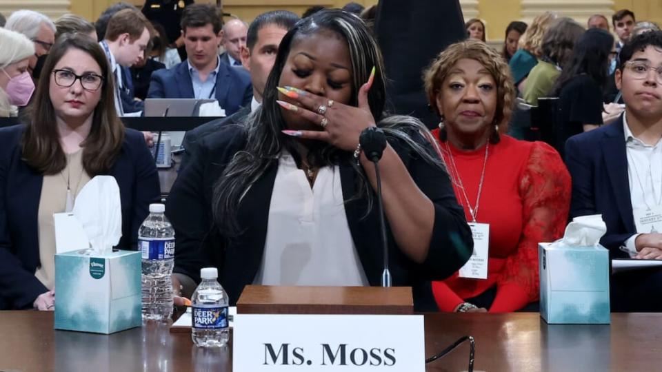 WASHINGTON, DC – JUNE 21: Wandrea ArShaye “Shaye” Moss, former Georgia election worker, becomes emotional while testifying as her mother Ruby Freeman watches during the fourth hearing held by the Select Committee to Investigate the January 6th Attack on the U.S. Capitol on June 21, 2022 in the Cannon House Office Building in Washington, DC. (Photo by Michael Reynolds-Pool/Getty Images)