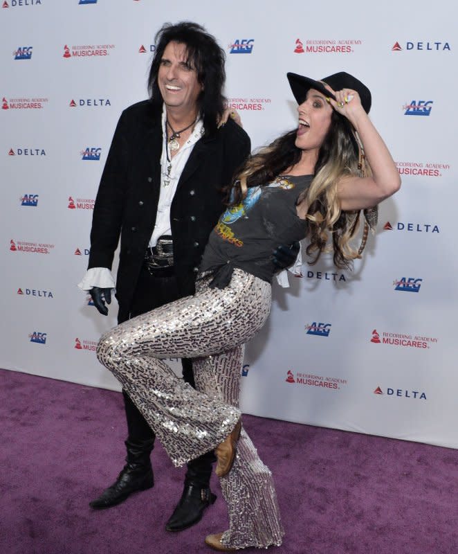 Alice Cooper and his daughter Calico Cooper arrive for the MusiCares Person of the Year gala honoring Aerosmith at the Los Angeles Convention Center on January 24, 2020. He turns 76 on February 4. File Photo by Jim Ruymen/UPI