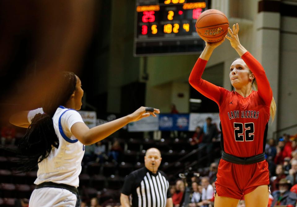 West Plains' Allyssa Joyner (22) attempts a field goal as the Lady Zizzers take on the Lutheran St. Charles Cougars in a girls Class 5 state semifinal game at Great Southern Bank Arena on Friday, March 17, 2023.