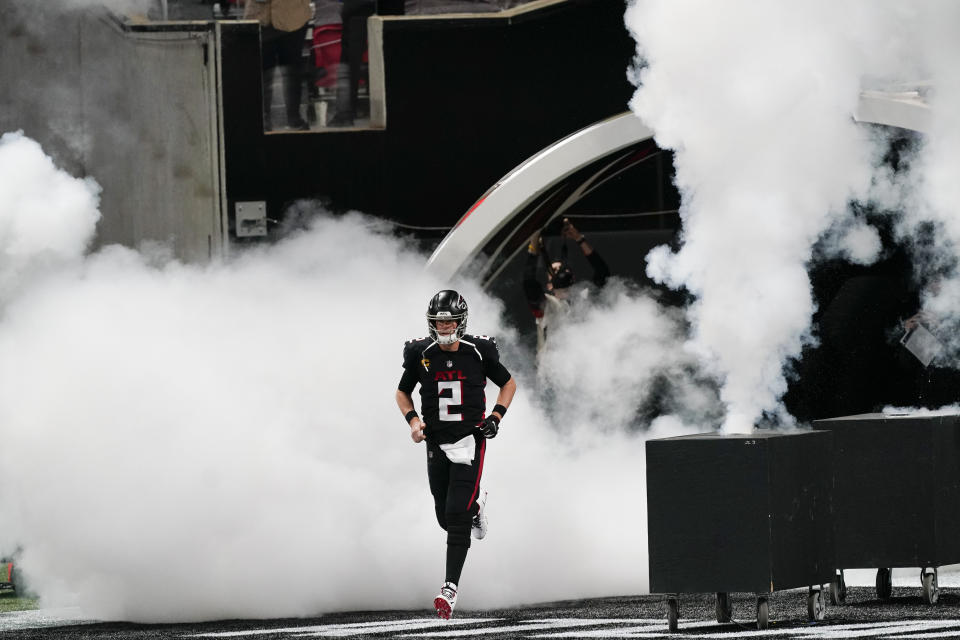 FILE - Atlanta Falcons quarterback Matt Ryan (2) takes the field before the first half of an NFL football game between the Atlanta Falcons and the Las Vegas Raiders, Sunday, Nov. 29, 2020, in Atlanta. Ryan announces his retirement from the NFL on Monday, April 22, 2024. (AP Photo/Brynn Anderson, file)