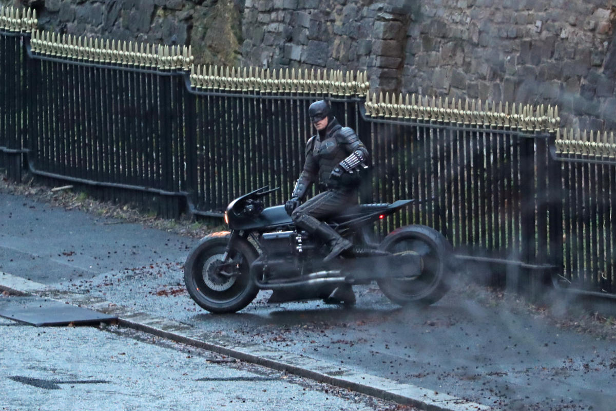 Batman leaps onto the Batcycle in new shots from the set of The Batman