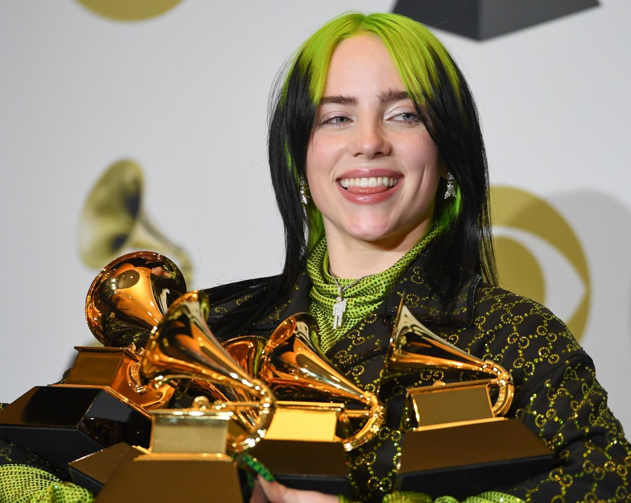 US singer-songwriter Billie Eilish poses in the press room with the awards for Album Of The Year, Record Of The Year, Best New Artist, Song Of The Year and Best Pop Vocal Album during the 62nd Annual Grammy Awards on January 26, 2020, in Los Angeles. (Photo by Frederic J. BROWN / AFP) (Photo by FREDERIC J. BROWN/AFP via Getty Images)