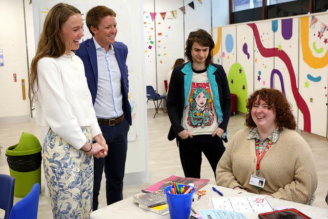 <p>Victoria Tetley / Grosvenor 2024</p> Olivia Henson and Hugh Grosvenor visit a charity supported by the Westminster Foundation on May 7, 2024.