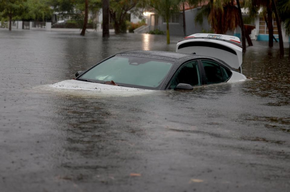 A vehicle sits in flood waters on June 12, 2024, in Hollywood, Florida. (Getty Images)