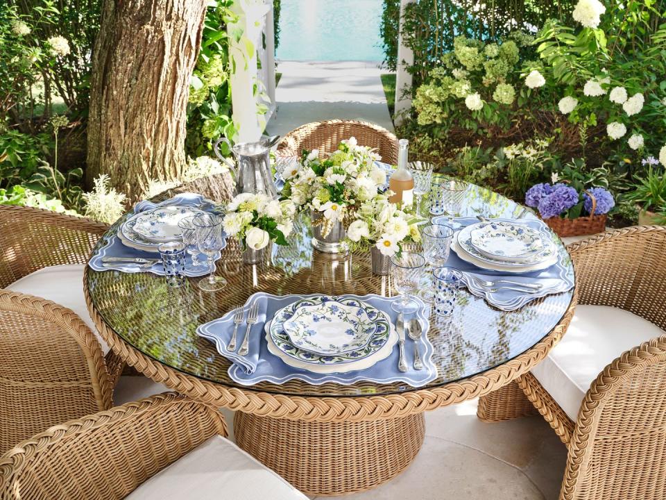 a table with a teacup and saucer on it