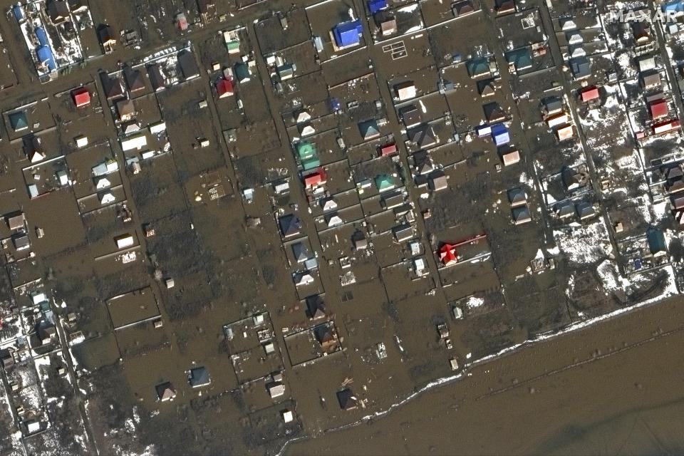 This image provided by Maxar Technologies, shows flooded areas in Orenburg, Russia, Wednesday, April 3, 2024. State media say Russia's government has declared the situation in flood-hit areas in the Orenburg region a federal emergency. (Satellite image ©2024 Maxar Technologies via AP)