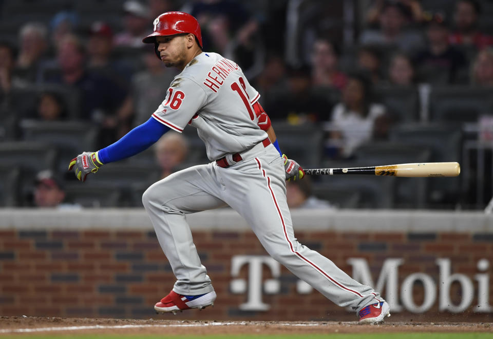 Philadelphia Phillies' Cesar Hernandez watches his two-run go-ahead ground ball single to left field during the ninth inning of a baseball game against the Atlanta Braves, Saturday, June 15, 2019, in Atlanta. (AP Photo/John Amis)