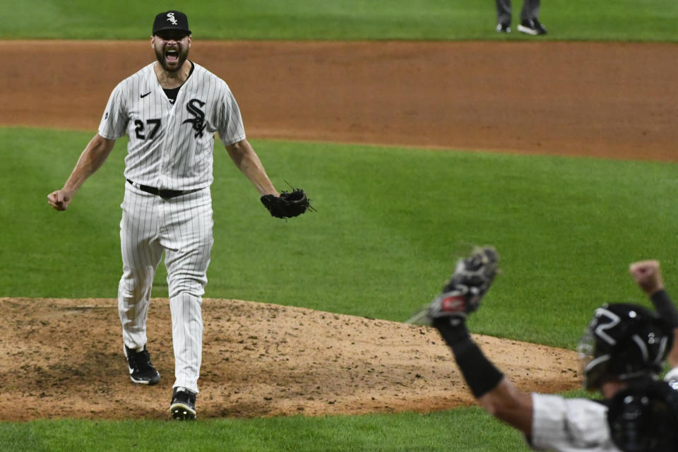 Chicago White Sox starting pitcher Lucas Giolito (27) reacts with catcher James McCann after closing out a no-hitter in a baseball game against the Pittsburgh Pirates, Tuesday, Aug. 25, 2020, in Chicago. The White Sox won 4-0. (AP Photo/Matt Marton)