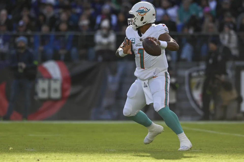 Dec 31, 2023; Baltimore, Maryland, USA; Miami Dolphins quarterback Tua Tagovailoa (1) throws during the first half against the Baltimore Ravens at M&T Bank Stadium. Mandatory Credit: Tommy Gilligan-USA TODAY Sports