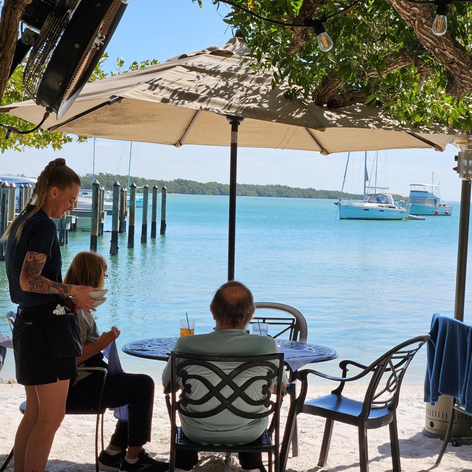 Mar Vista Dockside Restaurant, which offers seating at wrought-iron tables located under the buttonwood trees overlooking Sarasota Bay, photographed Feb. 24, 2024.