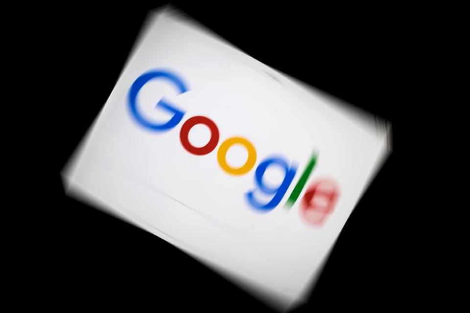 In this file photo taken on February 04, 2019 a picture taken on February 5, 2019 shows the Google logo displayed on a tablet in Paris.