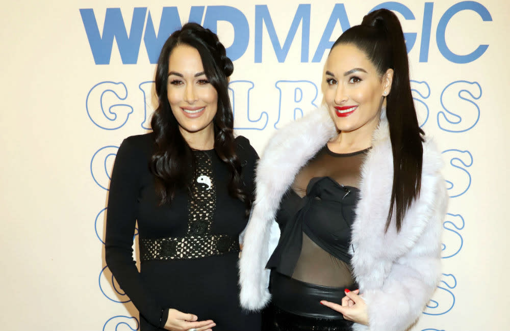 Nikki and Brie Bella want Selena Gomez to play them credit:Bang Showbiz