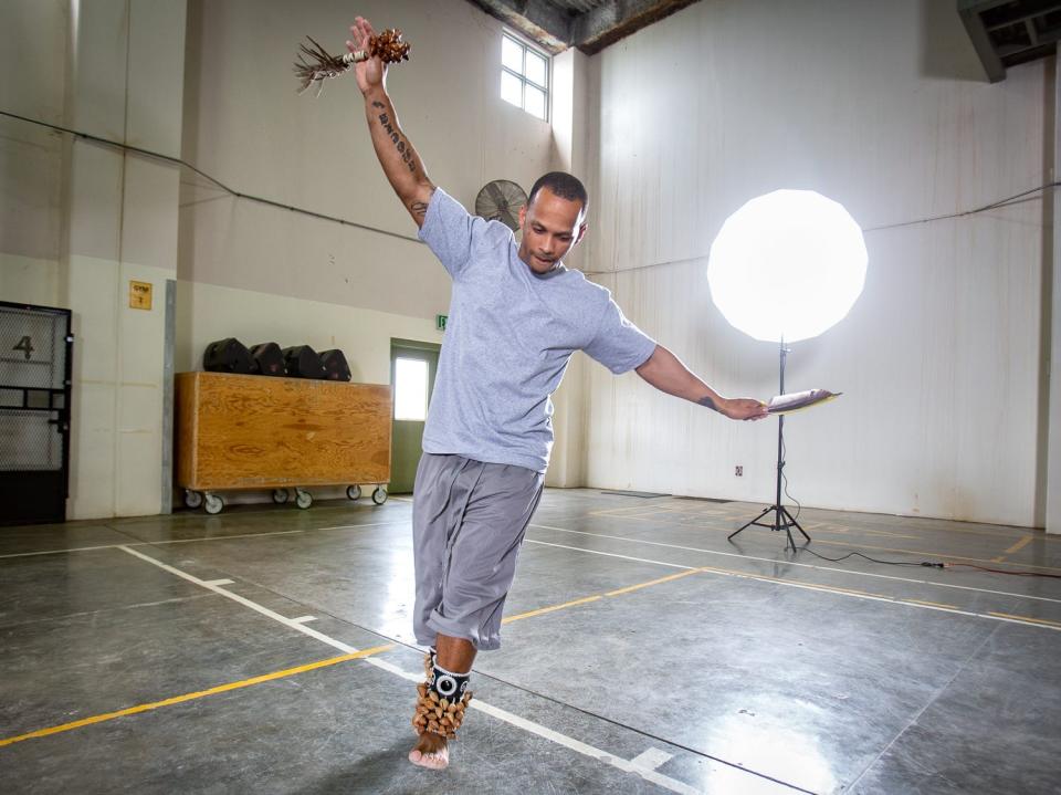 Peter Merts photos show California Prison Arts Programs A student practices a traditional Aztec dance, at Substance Abuse Treatment Facility - 2019