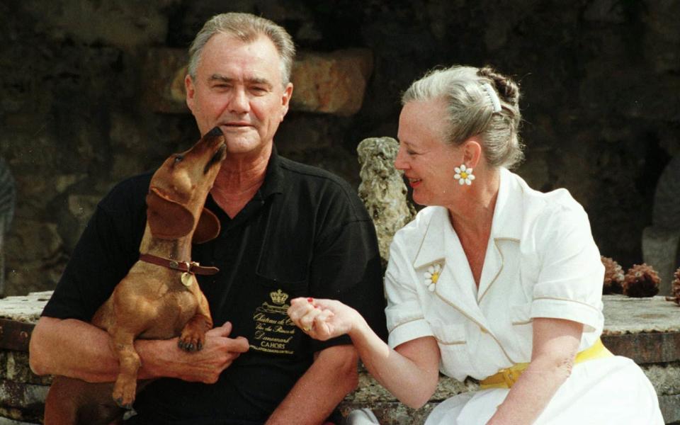 Danish Queen Margrethe and her husband Prince Henrik pose with their dog Celimene at the Caix castle, southwestern France, where they are on holiday Wednesday August 14, 1996 - Christophe Ena/AP