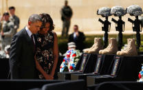 <p>President Barack Obama and first lady Michelle Obama pay their respects for the slain soldiers at the conclusion of memorial service at Fort Hood in Killeen Texas April 9, 2014. Last week, Army Spc. Ivan A. Lopez killed three and injured 16 others at Fort Hood before taking his own life. The shooting was the second deadly rampage at the base, one of the largest U.S. Army posts in the country, in five years. It raised questions about protecting soldiers at home and caring for troops battling mental illness, such as Lopez. (Kevin Lamarque/Reuters) </p>