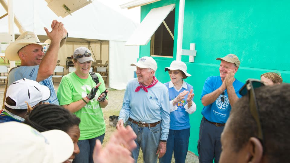 The Carters along with Garth Brooks and Trisha Yearwood dedicate the houses they helped build in Haiti in 2012. - George L. Hipple/Habitat for Humanity Int'l
