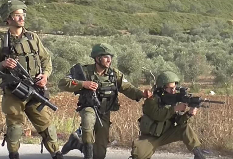 Israeli soldiers filmed cheering after shooting unarmed Palestinian with rubber bullets