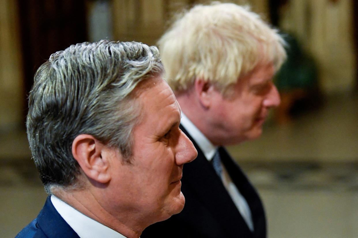 Boris Johnson (right) with the leader of the Labour Party Sir Keir Starmer (Toby Melville/PA) (PA Archive)