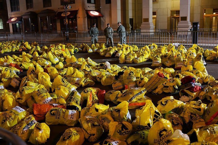 Unclaimed finish line bags belonging to runners viewed near the scene of a twin bombing at the Boston Marathon on April 16, 2013. More than 27,000 runners were in the 26.2 mile (42 kilometer) race that is one of the world's most prestigious marathons. Tens of thousands of people were packed around the finish. Many of the runners had completed the race when the bombs erupted