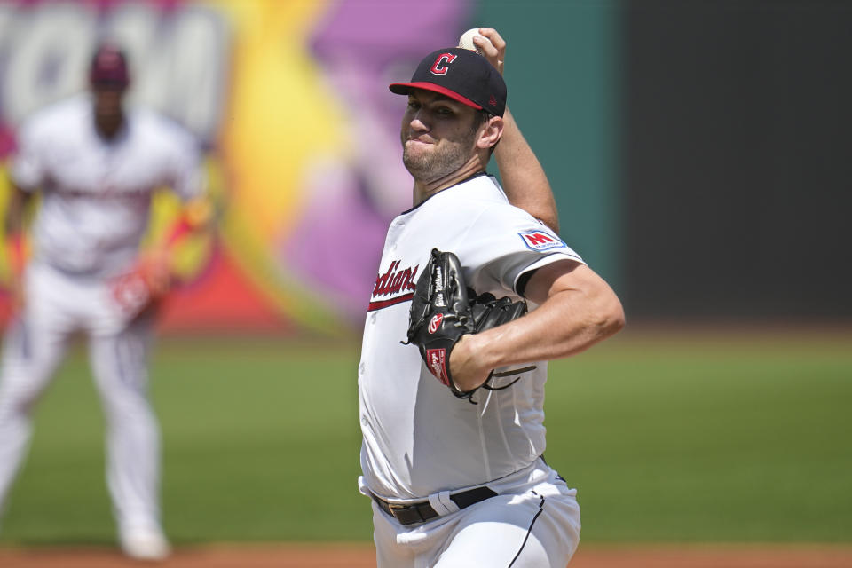 Cleveland Guardians' Gavin Williams pitches in the first inning of a baseball game against the Minnesota Twins, Wednesday, Sept. 6, 2023, in Cleveland. (AP Photo/Sue Ogrocki)