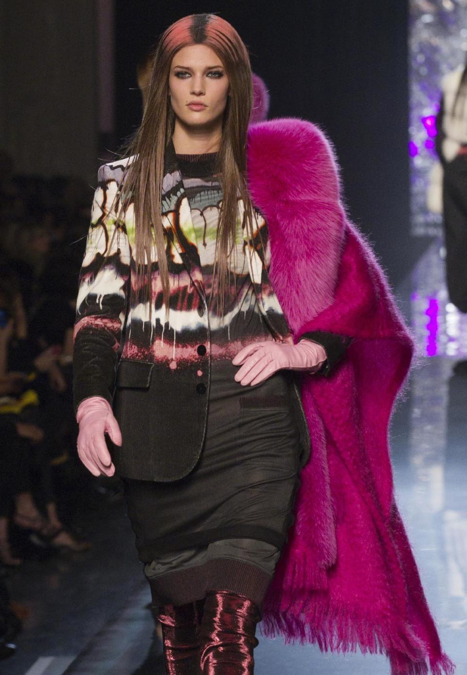 A model wears a creation by French fashion designer Jean Paul Gaultier as part of his presentation for Women's Fall-Winter, ready-to-wear 2013 fashion collection, during Paris Fashion week, Saturday, March 3, 2012. (AP Photo/Jacques Brinon)