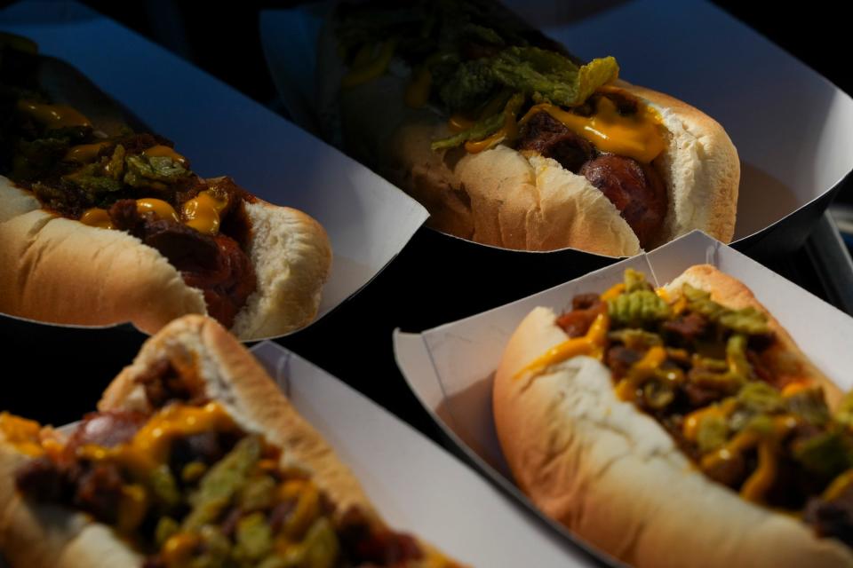 Aramark Sports and Entertainment’s short rib coney dogs are on display, Tuesday, March 26, 2024, during an Indianapolis Motor Speedway suite and hospitality tasting event at the IMS Gallagher Pavilion in Indianapolis. According to Aramark Sports and Entertainment, the short rib coney dogs are one of five featured concession items and include a “hot dog piled high with short rib, cheese sauce, and fried jalapeños.” The concession item can be ordered at various locations throughout the Speedway during this year’s Indianapolis 500.