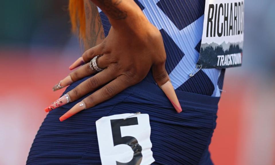 Richardson’s bejewelled nails.