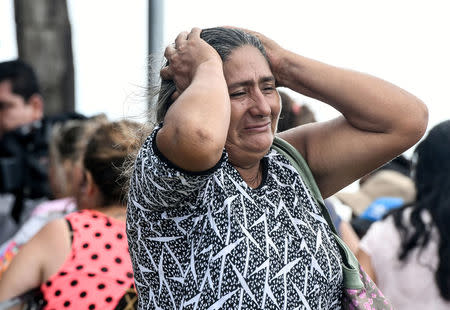 A relative of inmates of Palmasola prison reacts after a violent episode inside the prison in Santa Cruz, Bolivia, March 14, 2018. REUTERS/Rodrigo Urzagasti