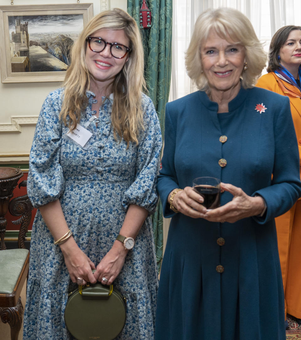 LONDON, ENGLAND - MARCH 08: Camilla, Duchess of Cornwall, President of WOW - Women of the World Festival, meets Emma Barnett as she hosts a reception to mark International Women's Day at Clarence House on March 8, 2022 in London, England. The Duchess of Cornwall was met by Jude Kelly CBE, Founder and CEO of The WOW Foundation, which runs WOW - Women of the World Festival.  Ms Kelly introduced guests including singer Melanie 'Mel B' Brown, former Prime Minister The Rt Hon Theresa May MP and the author and journalist, Elizabeth Day. (Photo by Arthur Edwards-WPA Pool/Getty Images)