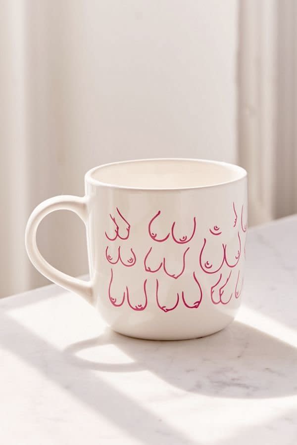 Get it <a href="https://www.urbanoutfitters.com/shop/topless-15-oz-mug2" target="_blank" rel="noopener noreferrer">here</a>