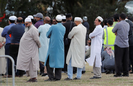 Relatives and other people arrive to attend the burial ceremony of the victims of the mosque attacks, at the Memorial Park Cemetery in Christchurch, New Zealand March 20, 2019. REUTERS/Jorge Silva