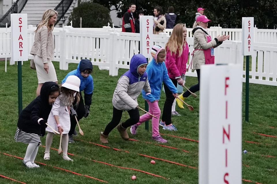 Children participate in the White House Easter Egg Roll in 2018.