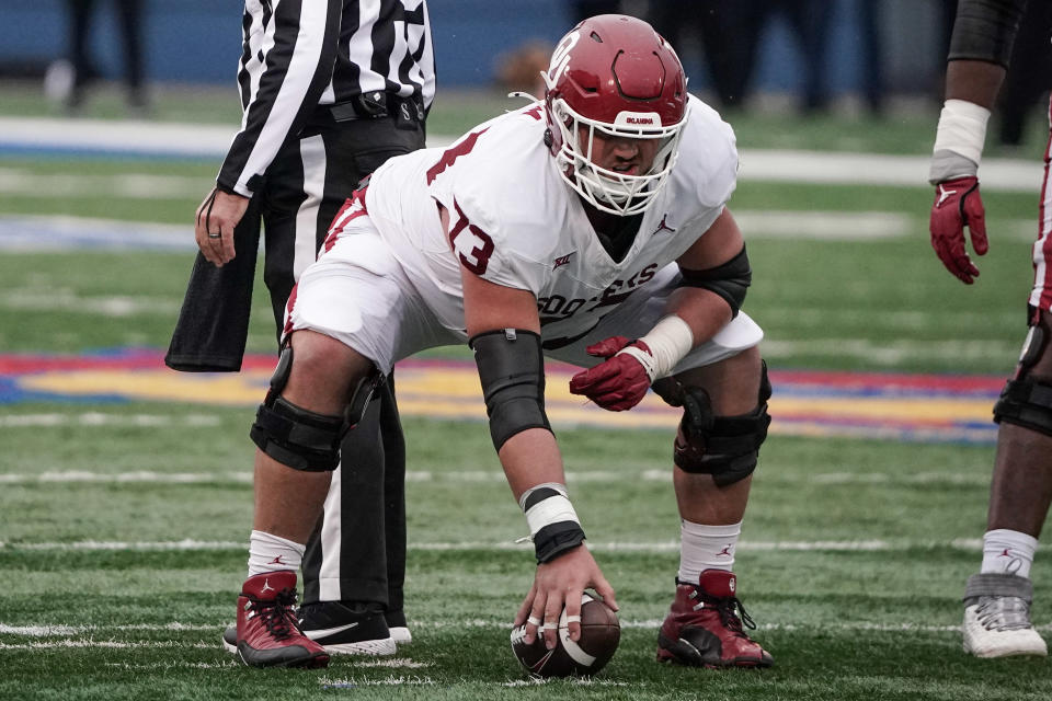 Oct 28, 2023; Lawrence, Kansas, USA; Oklahoma Sooners offensive lineman Andrew Raym (73) at the line of scrimmage against the Kansas Jayhawks during the game at David Booth Kansas Memorial Stadium. Mandatory Credit: Denny Medley-USA TODAY Sports