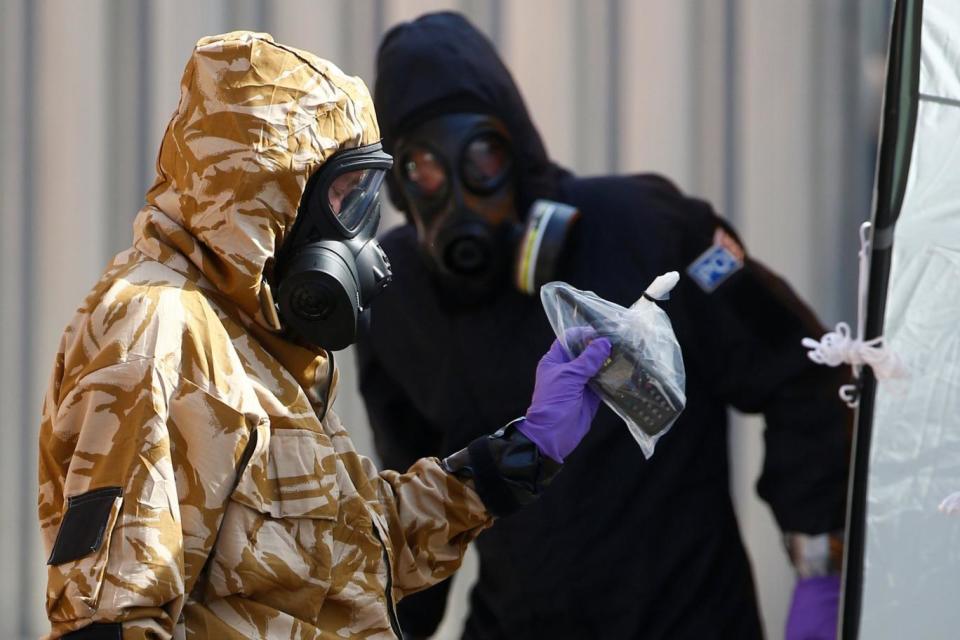 Fatal poisoning: Forensic investigators search an area in Amesbury (REUTERS)