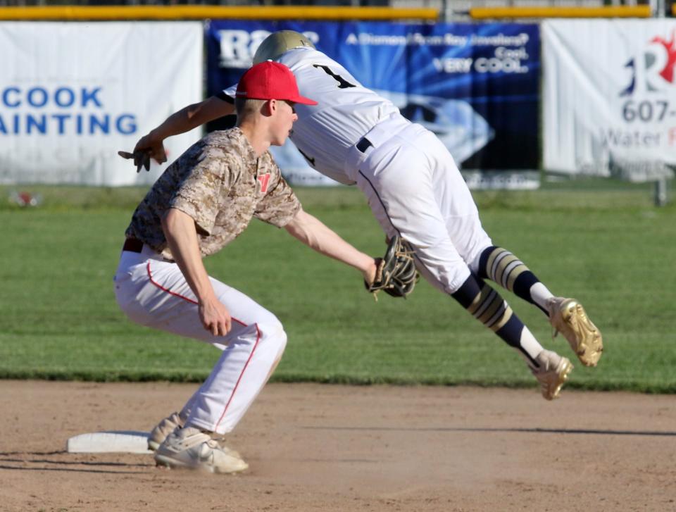 Waverly shortstop Joey Tomasso tags out Elmira Notre Dame's Cam Johnson at second base during the Crusaders' 2-0 win in baseball May 10, 2022 at Notre Dame High School.